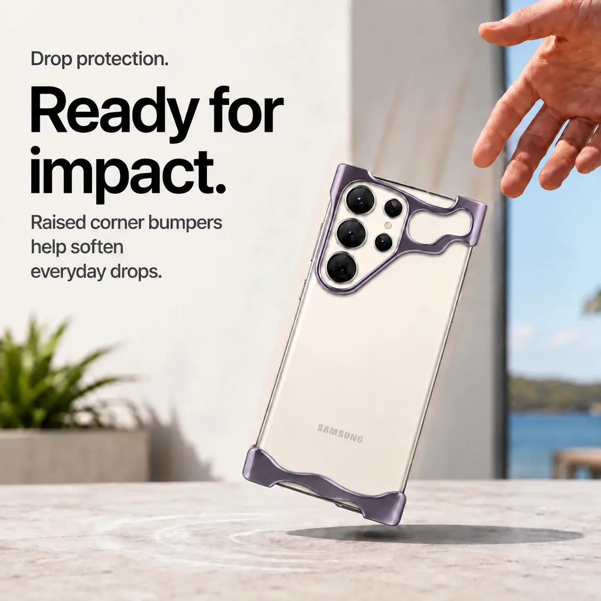 Purple open metal phone bumper case shown above a desk in a drop protection scene #color_Purple