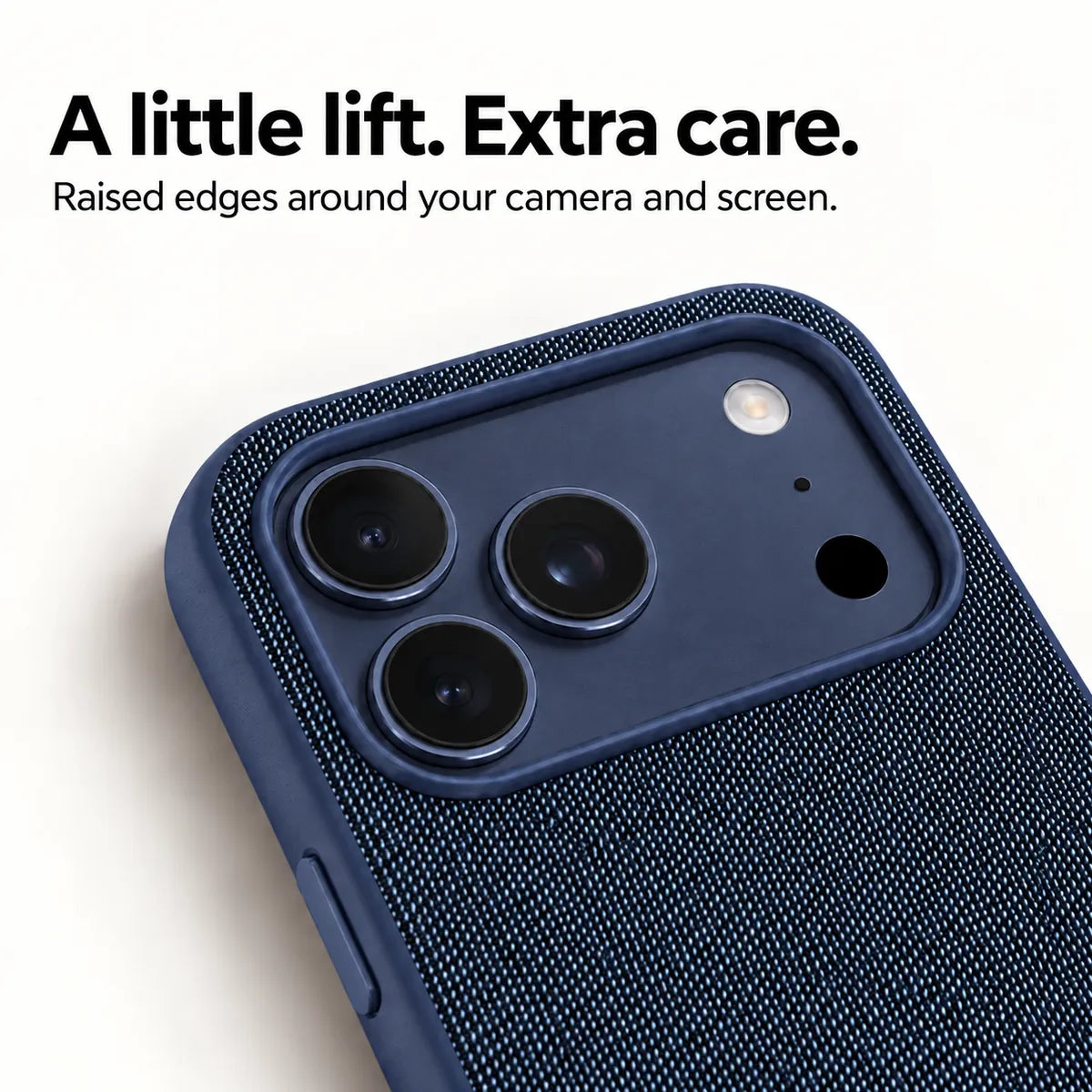 Close view of the raised camera surround and woven fabric on a Deep Blue phone case. #color_Deep Blue
