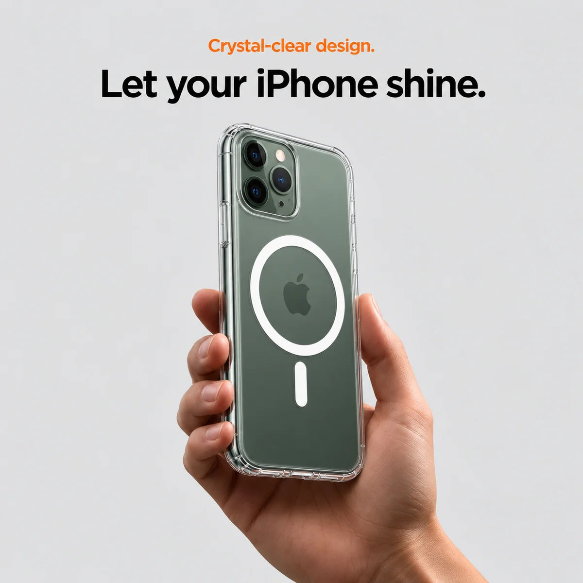 Clear magnetic phone case held at an angle, showing its transparent back and camera openings. #iPhone Model_iPhone 11 Pro Max