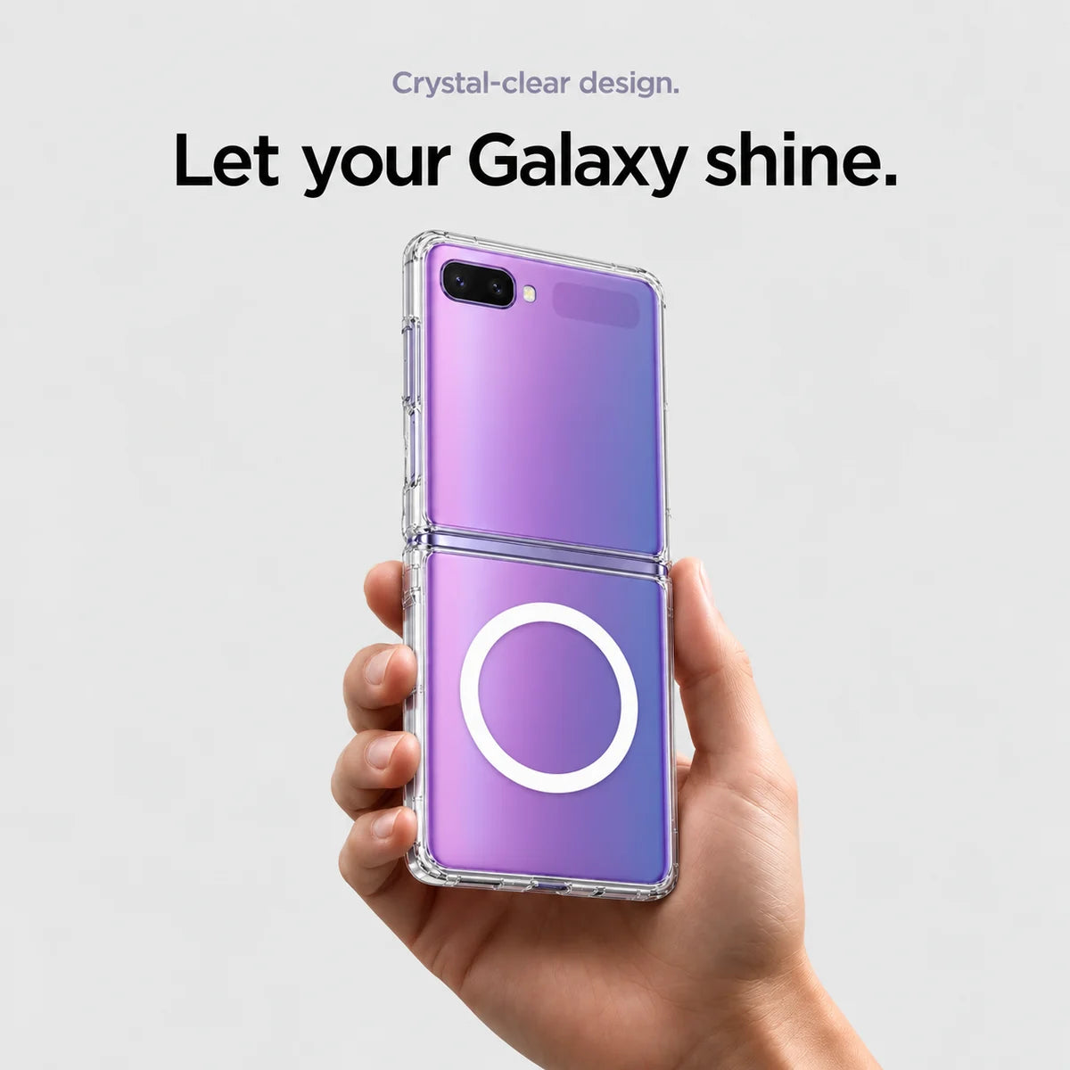 Clear magnetic phone case held at an angle, showing its transparent back and camera openings. #Samsung Model_Samsung Z Flip