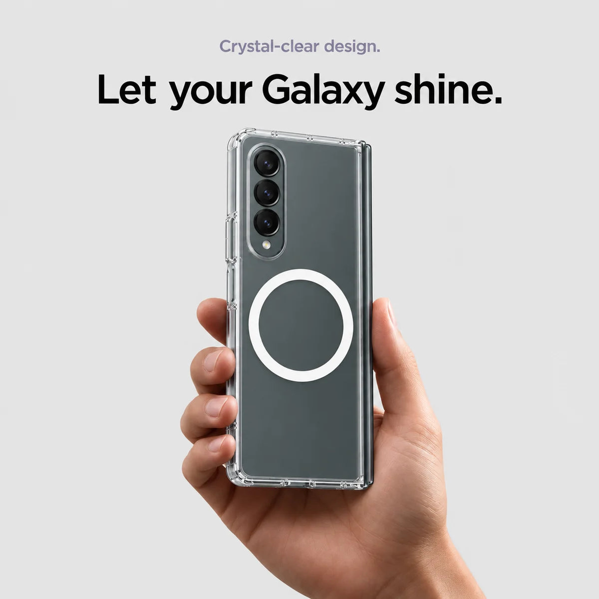 Clear magnetic phone case held at an angle, showing its transparent back and camera openings. #Samsung Model_Samsung Z Fold 4