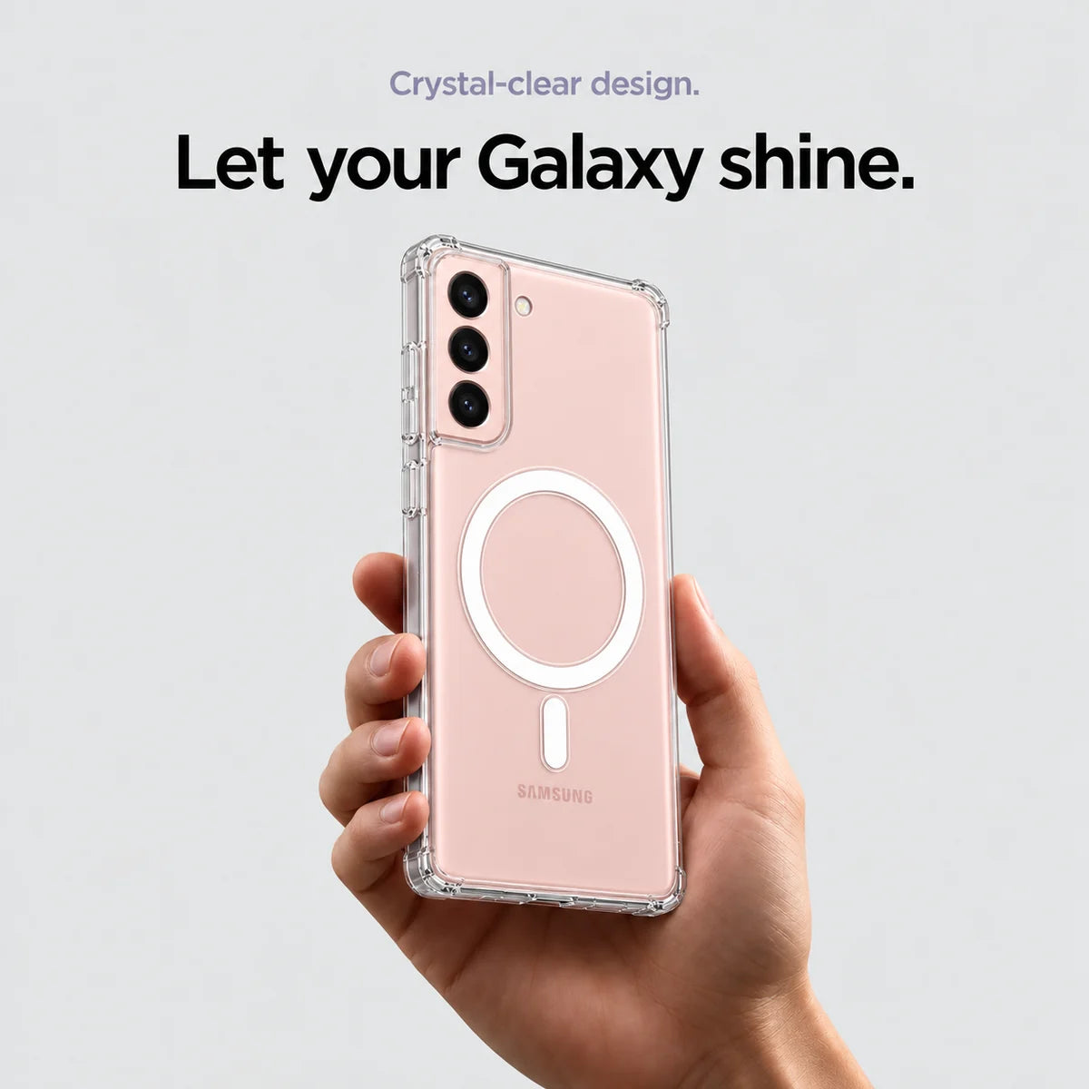 Clear magnetic phone case held at an angle, showing its transparent back and camera openings. #Samsung Model_Samsung S21