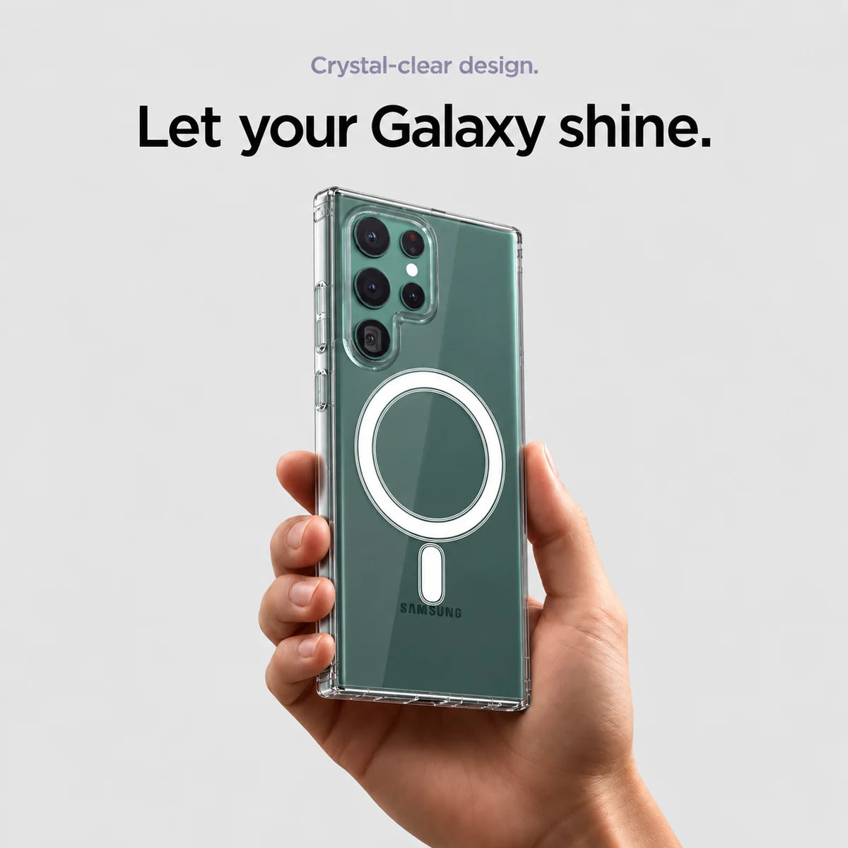 Clear magnetic phone case held at an angle, showing its transparent back and camera openings. #Samsung Model_Samsung S22 Ultra