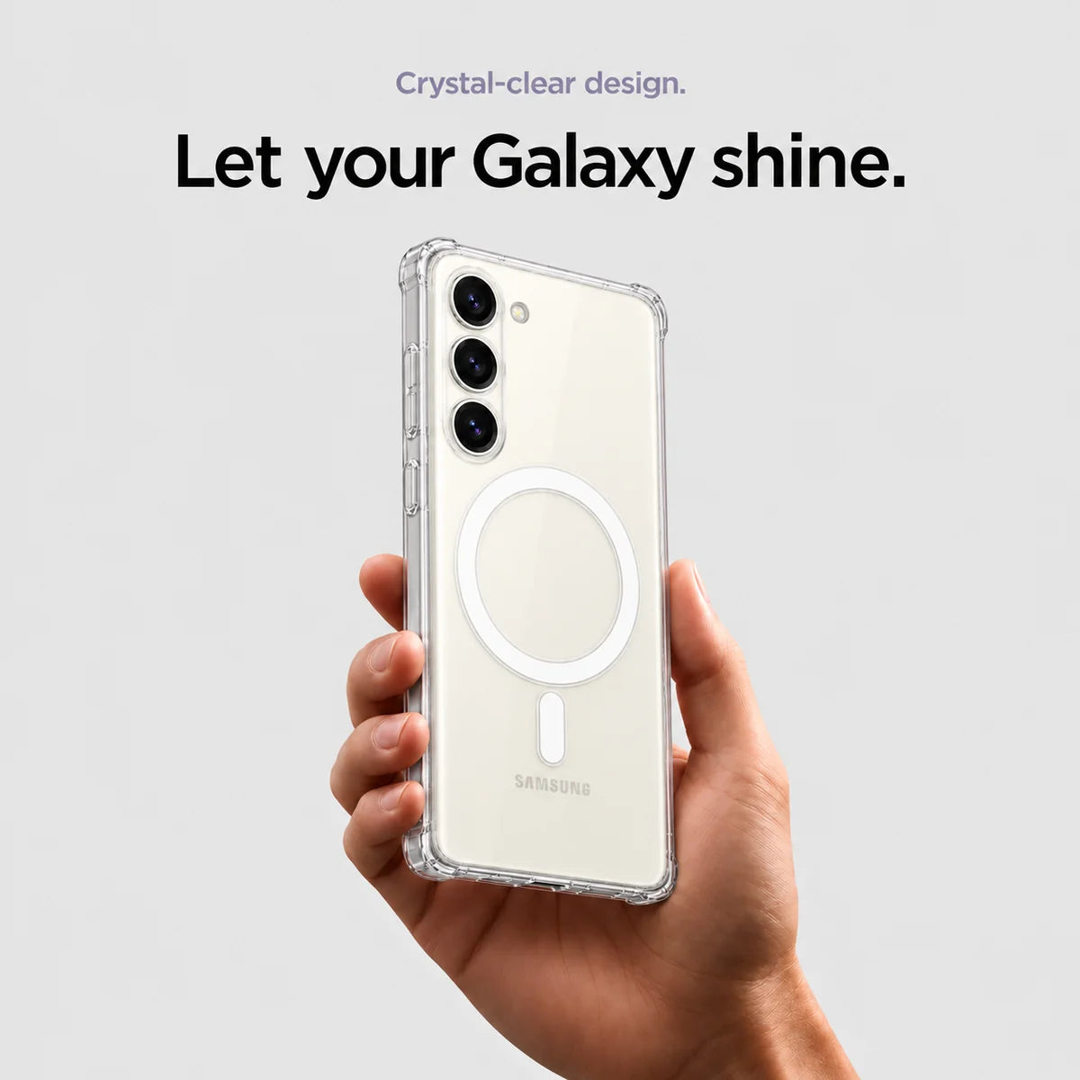Clear magnetic phone case held at an angle, showing its transparent back and camera openings. #Samsung Model_Samsung S23