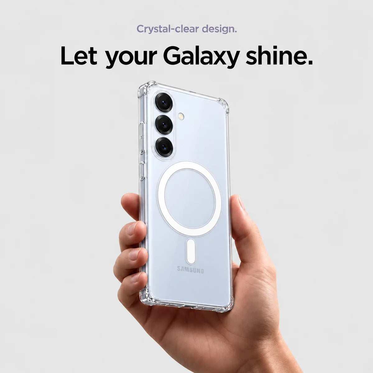 Clear magnetic phone case held at an angle, showing its transparent back and camera openings. #Samsung Model_Samsung S25