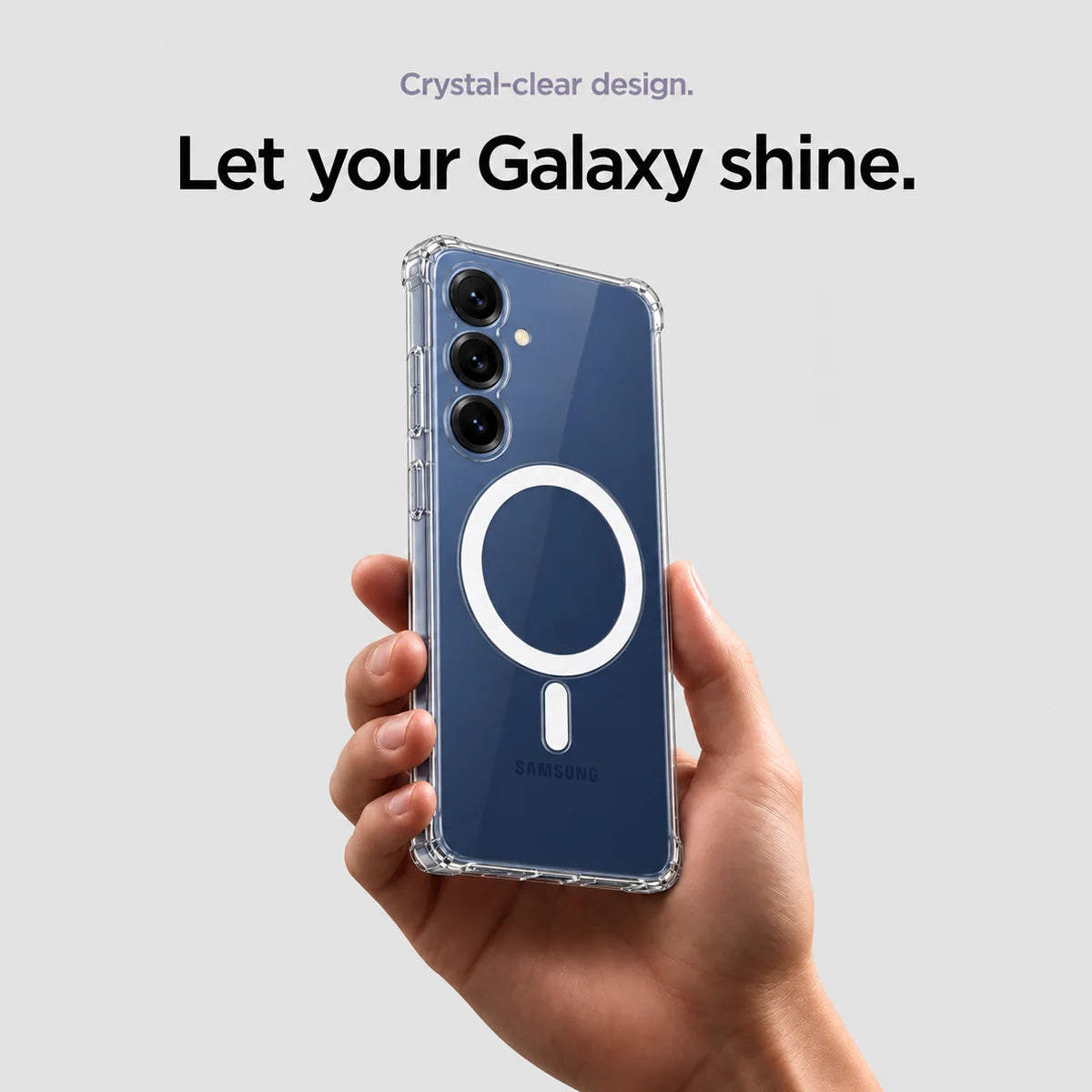 Clear magnetic phone case held at an angle, showing its transparent back and camera openings. #Samsung Model_Samsung S25+